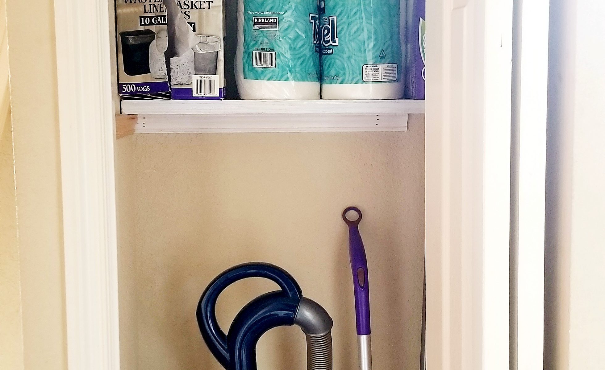 Making shelves for the broom closet