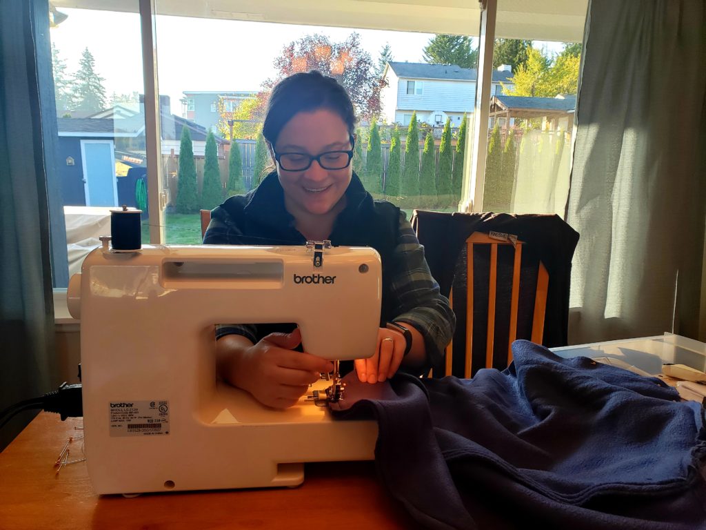 Jess learning to sew pillowcases