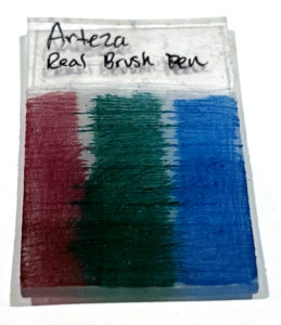 Arteza Real Brush Pens on Shrinky Dinks